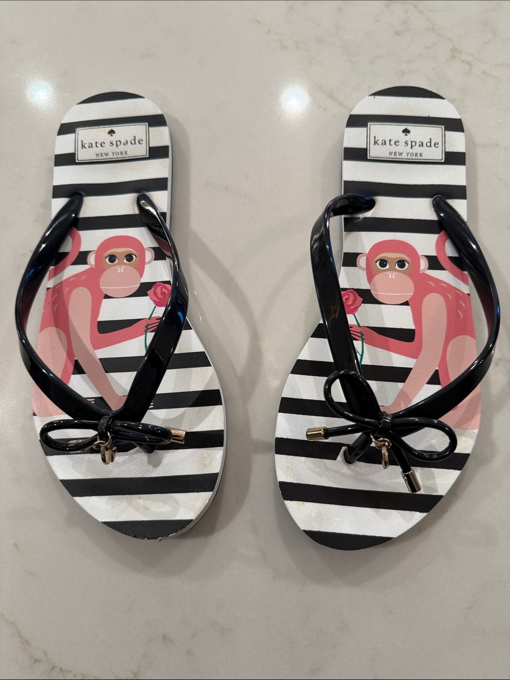 kate spade Black & Pink Striped Monkey Bow Flip Flops